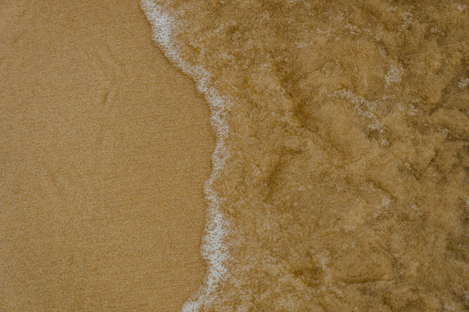 Catch the shoreline in soft layers and clean detail — featured