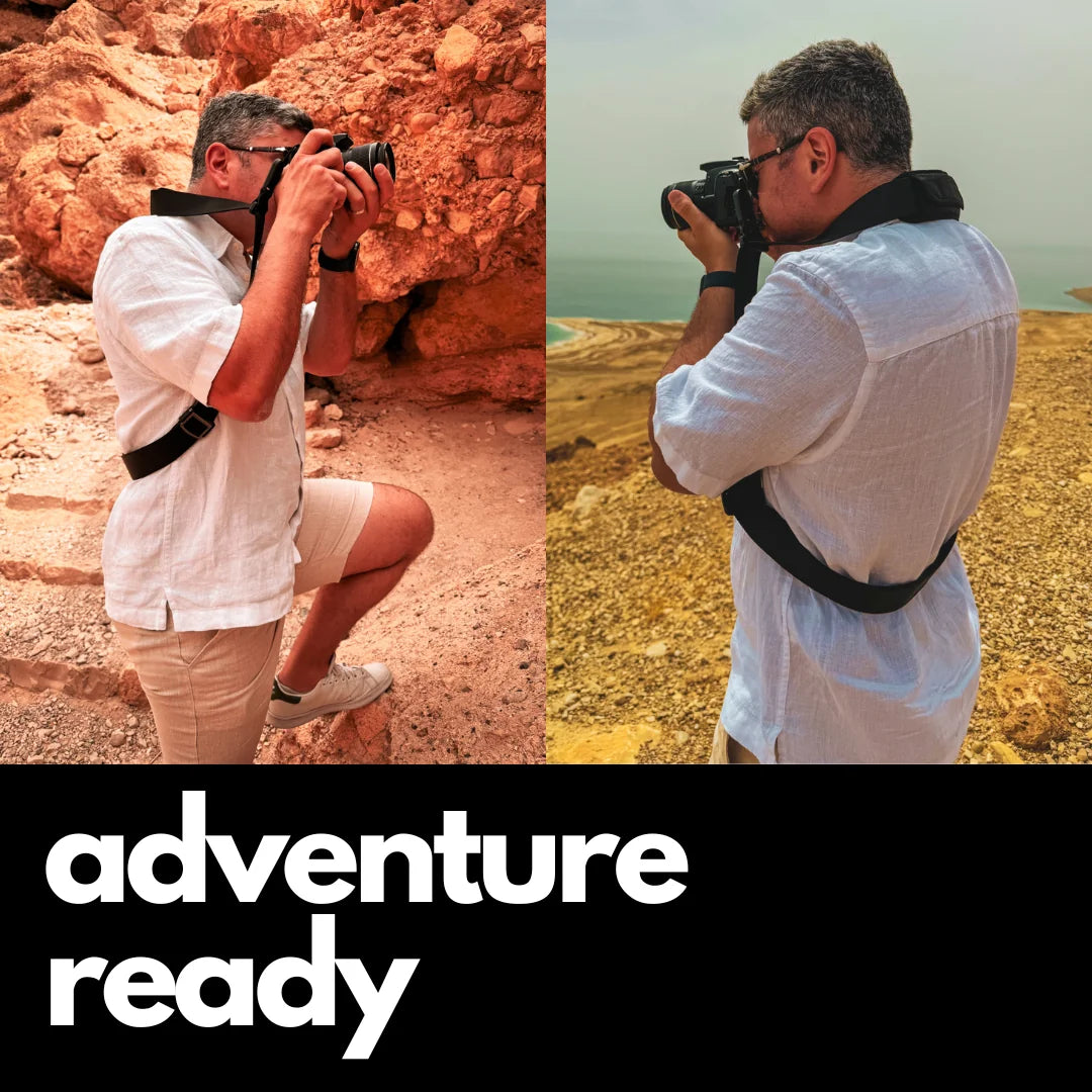 Camstrap Explorer hands-free camera harness worn over both shoulders, supporting a DSLR with a telephoto lens.