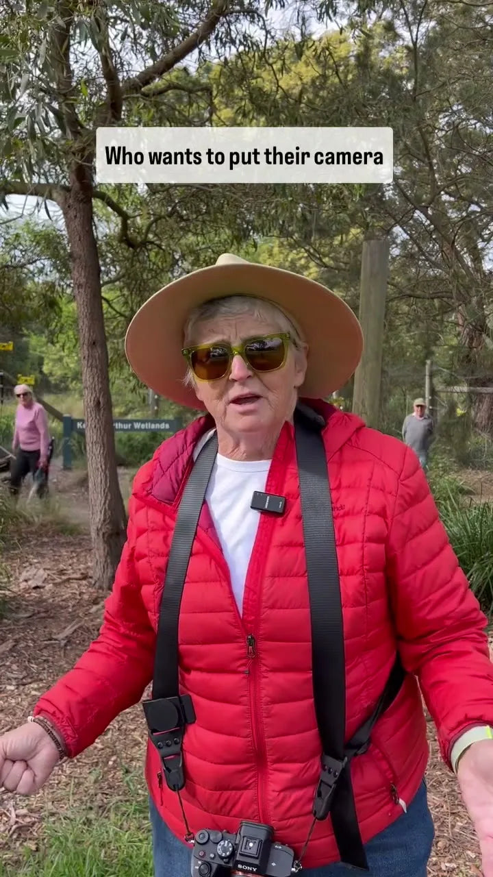 Derry Caulfield wearing a Camstrap harness over both shoulders